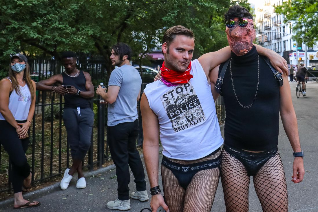 Scenes of men and women participating in the 2020 Drag March through Greenwich Village